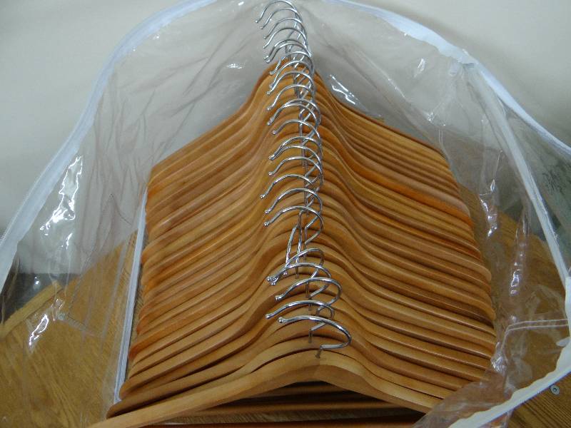 lot 823 image: Lot of 25 wooden hangers