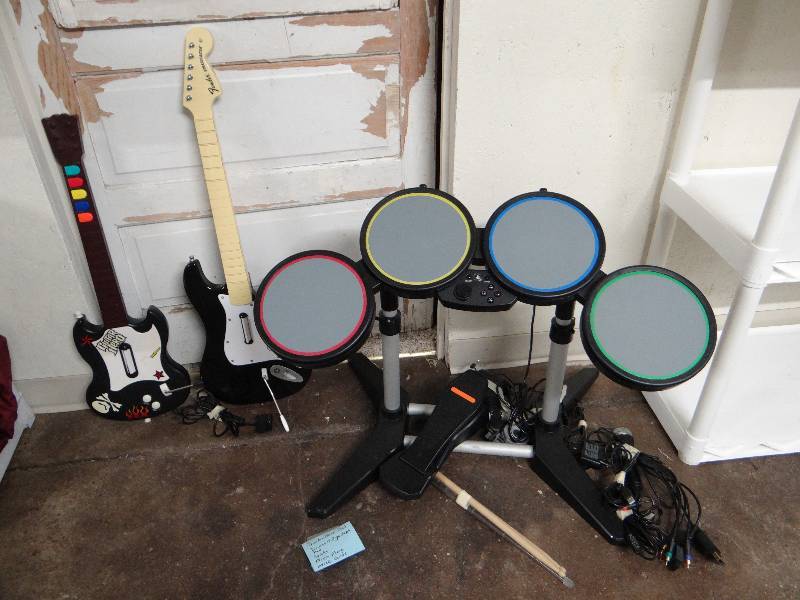 lot 838 image: Guitar hero drum set & guitars