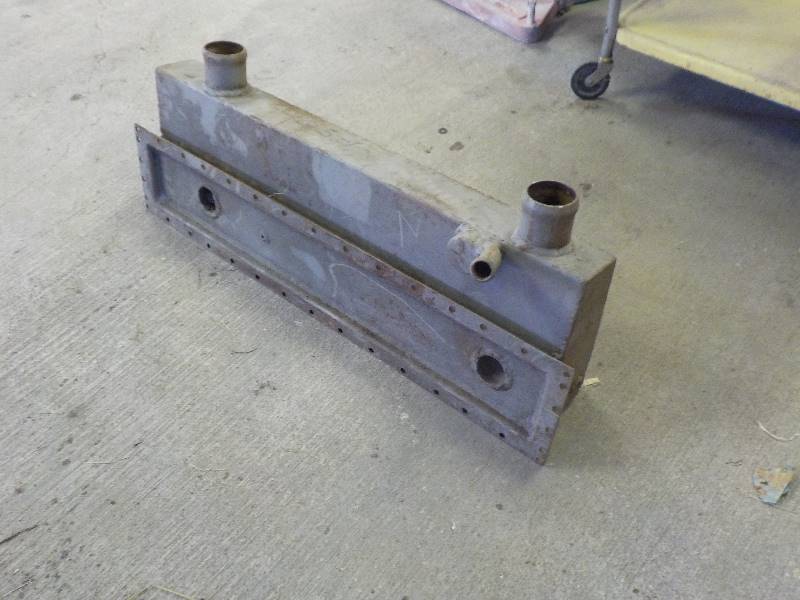 lot 3588 image: CAT radiator tank Taalman engineered products LTD 405-1