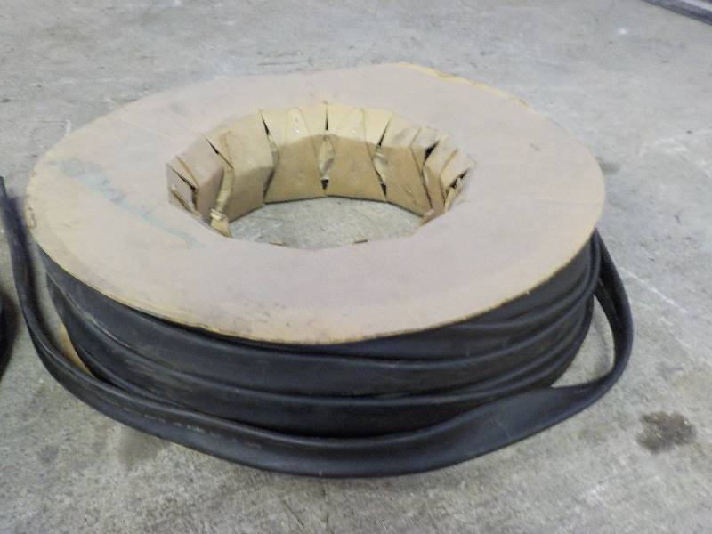 lot 3603 image: roll of rubber hose