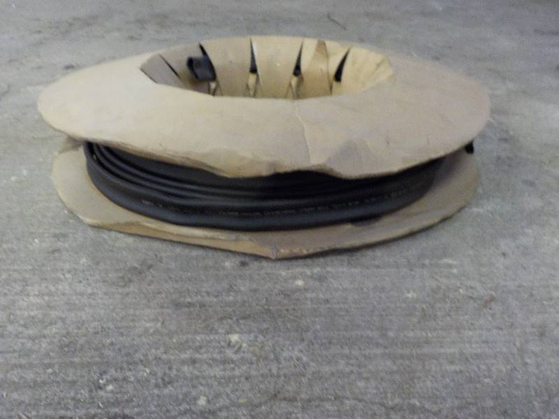 lot 3604 image: roll of rubber hose