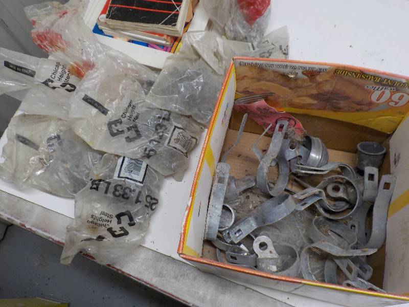 lot 3735 image: 5 bags of fence holders, 2 bags of hammer in staples, box of chainlink brackets