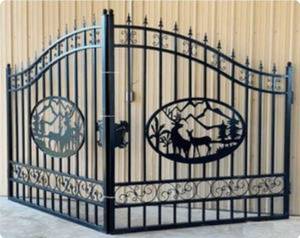 lot 1923 image: 2024 Unused - 20ft Dual Swing Bi-Parting Wrought Iron Gate. With Artwork Deer in the Middle of the Gate Frame - Has Some Scrapes & Blemishes