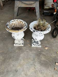 lot 24 image: Pair of cast-iron flower planters