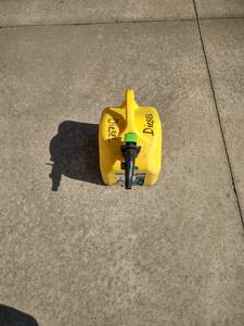 lot 1051 image: 5 gallon diesel can with contents