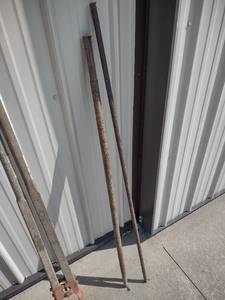 lot 1055 image: two four and a half foot metal rods