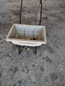 lot 1083 image: Red devil broadcast spreader and contents