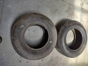 lot 1102 image: two tires one is 878- 15 St and the other is unsure