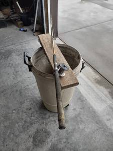lot 1117 image: Penn 209 level wind baitcast reel on 84 inch Pole