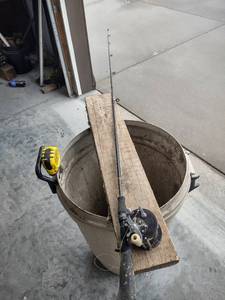 lot 1120 image: a pen 85 baitcasting reel on 72-in ugly stick