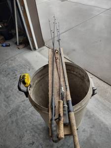 lot 1123 image: four fishing poles some have damage
