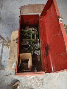lot 1150 image: toolbox with sickle mower guards and teeth