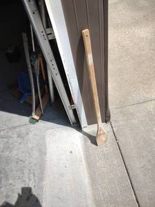 lot 1160 image: long handled wood paddle