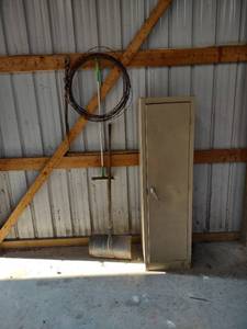 lot 1167 image: metal cabinet snow shovel and other items on wall plus contents of cabinet