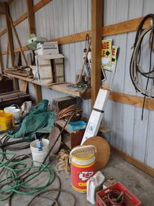 lot 1296 image: everything on floor and wall up to the trailer and lumber