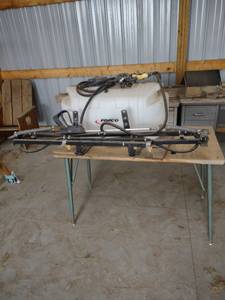 lot 1302 image: fimco 25 gallon sprayer and table