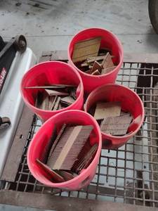lot 1343 image: four cans of nail gun nails