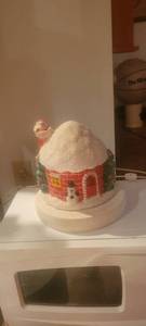 lot 2002 image: Santa going down. Chimney on round house needs light bulb