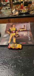 lot 2028 image: Clint Bowyer picture. And match car