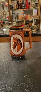 lot 2054 image: Seven inch horse stein has chip
