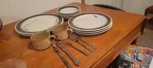 lot 2241 image: 2 big plates, 3 smaller plates, 3 bowls, 2 cups, 3 forks and 2 knives.