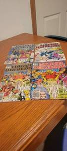 lot 2249 image: Four marvel universe comic books