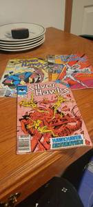 lot 2256 image: Three silver hawks comic boots
