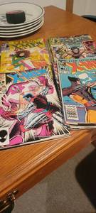 lot 2266 image: 13 X man comic books.