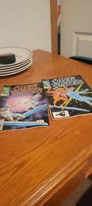 lot 2278 image: 2 silver surfer comic books.