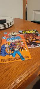 lot 2281 image: 3 Titans comic books.
