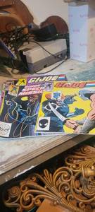 lot 2328 image: Seven g I joe comic books