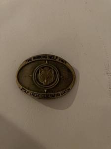 lot 3051 image: The winning Wolf pack belt buckle
