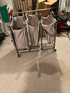 lot 3104 image: 3) Bags laundry sorter with 1 blanket