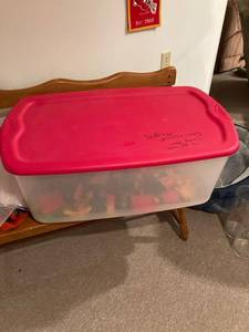 lot 3125 image: large clear tote, red lid, miscellaneous toys