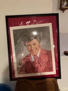 lot 3148 image: 38 12 x 23 12 frame with Liberace