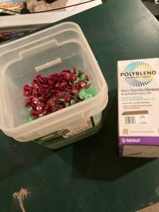 lot 3292 image: Bucket of plastic-tops & Polly blend grout half a box