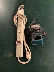 lot 3302 image: Makita charger untested & extension cord