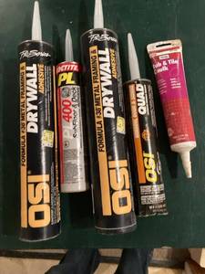 lot 3325 image: 2) tubes of drywall adhesive and other tubes