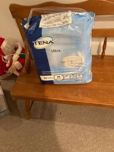 lot 3361 image: TENA ultra medium brief disposable pants couple missing