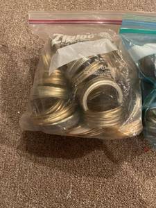 lot 4008 image: 2 bags of tin lids