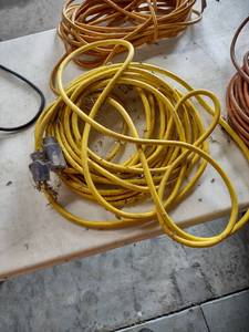 lot 1180 image: heavy duty yellow extension cord