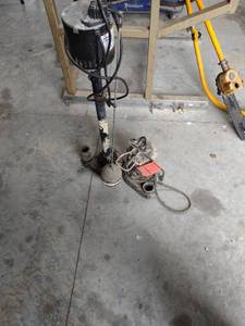 lot 1205 image: two sump pumps