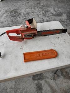 lot 1209 image: homelite 14 inch electric chainsaw runs