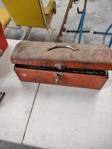lot 1222 image: toolbox full of drill bits