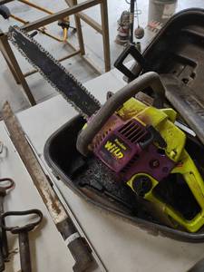 lot 1249 image: Poulan wild chainsaw and carrying case