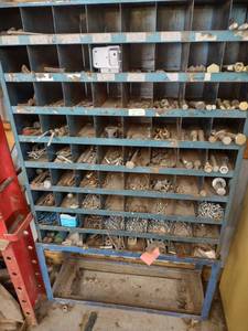 lot 1294 image: metal bolt band approximately 5 ft tall and contents