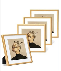 lot 24073 image: 4x4 Picture Frame Set of 4, Matted Gold Simple Modern Brushed Thin Aluminum Metal Square Photo Frame Fits 3x3 with Mat or 4 x 4 without Mat Display For Tabletop or Wall Collage
