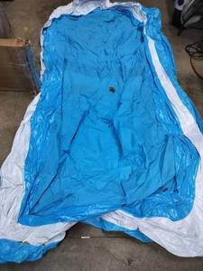 lot 1975 image: Outdoor Inflatable Pool With Punp. 106In X 56In