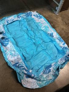 lot 9865 image: Small Inflatable Pool 70in X 49in