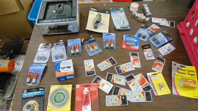 lot 546 image: huge lot of automotive light bulbs - watch and flat batteries - much more